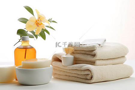 毛巾花背景图片_白色背景的毛巾和水疗用品，带两个花盆