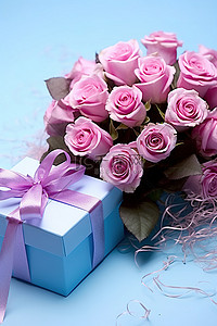花玫瑰背景图片_紫色和蓝色玫瑰，带蓝色盒子和花束