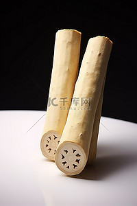 茴香小油条背景图片_两根装满茴香籽的木棍