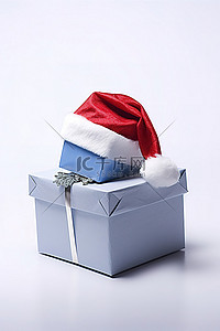 白色背景上的圣诞帽和蓝色圣诞礼物盒