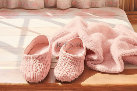 拖鞋拖鞋背景图片_拖鞋放在粉色毛衣上面