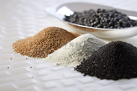 面粉面粉背景图片_谷物粉和黑色种子