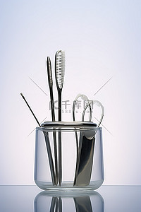 镜子和照镜子的人背景图片_玻璃容器中的牙科器械