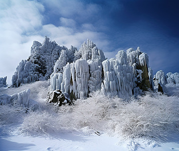 雪花落背景图片_冰雪覆盖的岩石