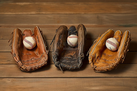 消化过程动图背景图片_木质表面上的三副旧棒球手套