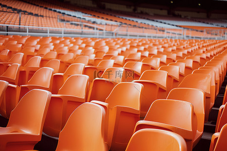 体育场内背景图片_体育场内有空白座位的橙色座位