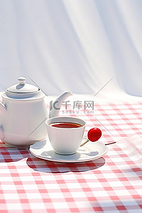 蓝色和白色桌布上的杯子和茶壶