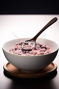 米粥背景图片_用勺子舀一碗热粥