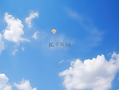 风筝的背景背景图片_蓝天白云中的风筝