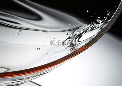 玻璃碗背景图片_玻璃碗中的一小滴水