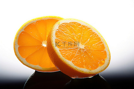 橙子脆片棉花背景图片_两片橙子