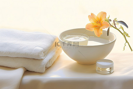 毛巾花背景图片_白色毛巾，碗里装有肥皂和花