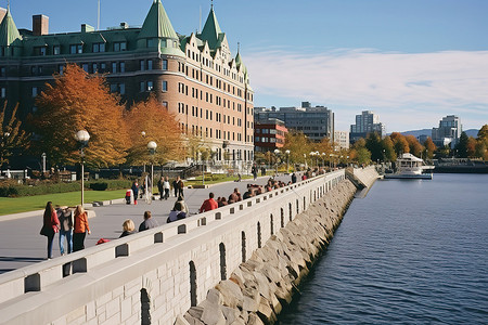 加拿大背景图片_水体旁边排列着建筑物和人群的墙
