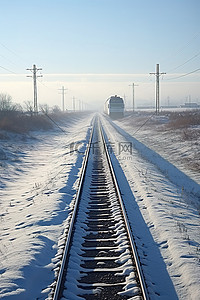 蓝天轨道背景图片_冬天的火车轨道与蓝天