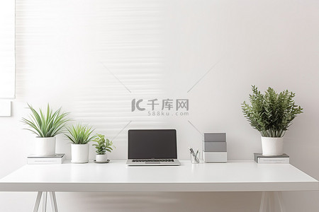 办公室里背景图片_现代家庭办公室里有绿色植物的白色办公桌