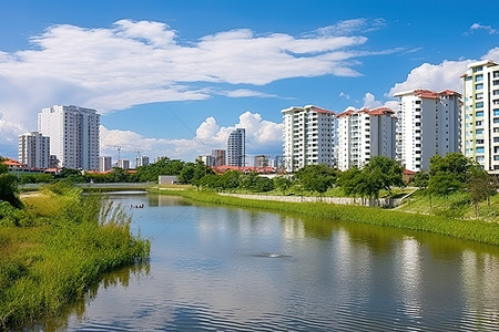 环保循环使用背景图片_建筑物和摩天大楼前的运河