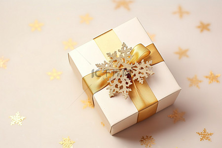 礼品包装丝带背景图片_带礼品盒丝带和雪花的金色礼品包装