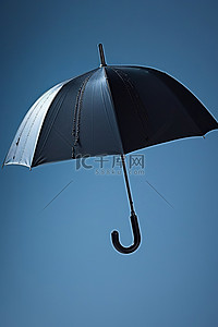 一把伞背景图片_一把伞站在雨中