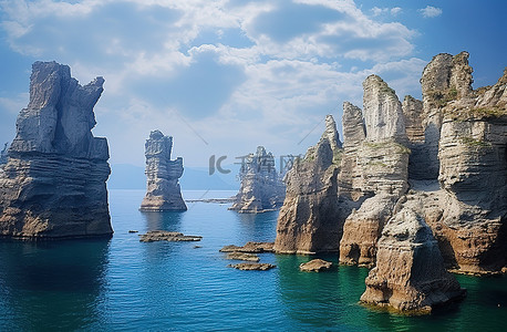 奇怪的背景图片_蓝色海洋旁边的一组岩层