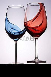 红酒背景图片_两个酒杯立着，一个是红色的