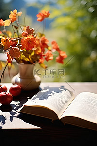 書本背景图片_一本打开的书，外面的桌子上放着鲜花