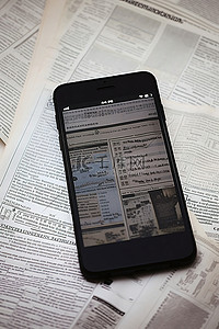 iphone三视图背景图片_背景中的纸张上放置着一部 iPhone