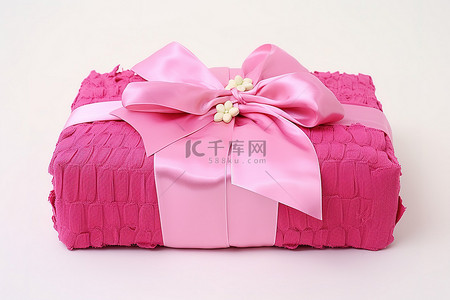 花卉礼盒背景图片_粉色蝴蝶结花卉礼盒