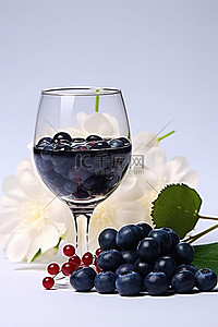 樱桃蓝莓背景图片_蓝莓配酒花和咖啡杯