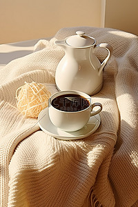毯子背景图片_咖啡壶和针织毛衣