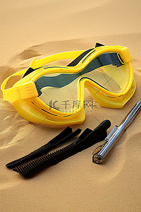 通气管背景图片_沙滩上的一套脚蹼和护目镜以及通气管