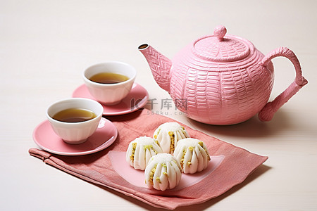 新年糖果包背景图片_茶壶杯子和饼干，旁边是一片茶