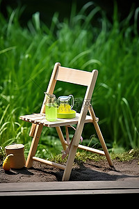 绿色果汁背景图片_绿色草坪前的小折叠椅