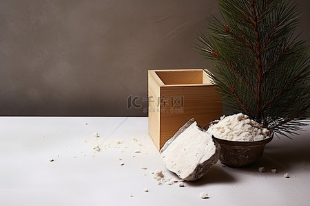 民间工艺背景图片_米盒圣诞树和顶部的松果