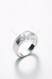 白色背景上的钻石结婚戒指
