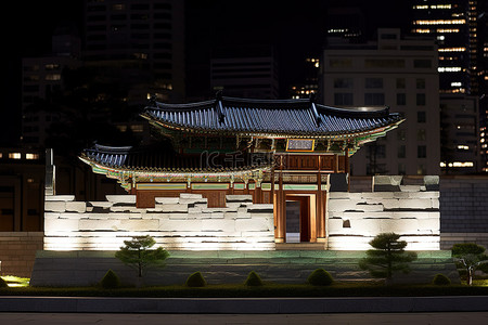 夜晚的首尔韩屋，背景是灯光
