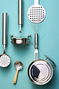 厨房用具不锈钢背景图片_蓝色背景中的不锈钢炊具和器皿