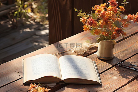 一本打开的书放在一张质朴的木桌上