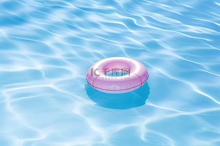 泳池背景图片_蓝色海洋游泳池中漂浮的粉色星环