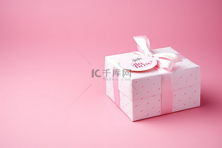 情人节礼物盒背景图片_粉红色背景中漂亮的礼物盒