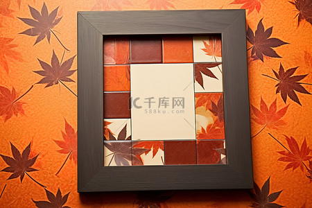 橙色枫叶背景图片_橙色背景上秋叶的相框