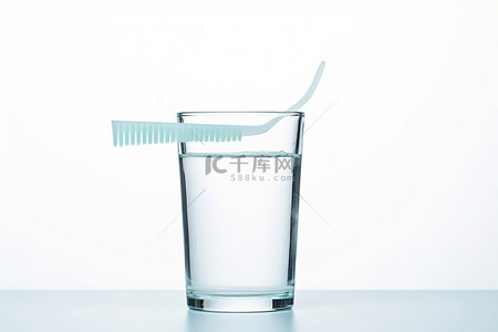 健康卫生背景图片_牙刷在一杯白水中
