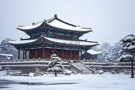 冬天古建筑背景图片_韩国古老的宫殿和花园在降雪中