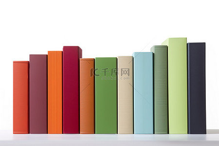 书籍教育背景图片_白色背景上的一堆彩色书籍