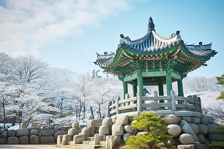 将背景图片_在冰冷的蓝色风景前的古韩国宝塔