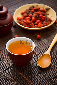 银耳枸杞汤背景图片_乌龙茶旁边有一壶枸杞汁