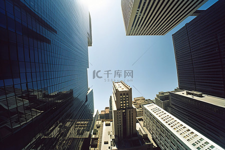 俯视城市背景图片_阳光明媚的日子里俯视商业建筑