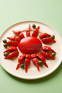 螃蟹蔬菜背景图片_用坚果和辣椒装饰的红蟹盘