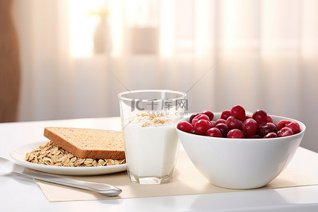 燕麦牛奶背景图片_蔓越莓麦片燕麦和烤面包放在台面上