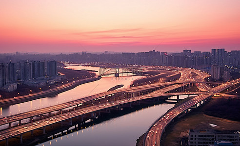 江边日落背景图片_首尔河和首尔河上的路的景色