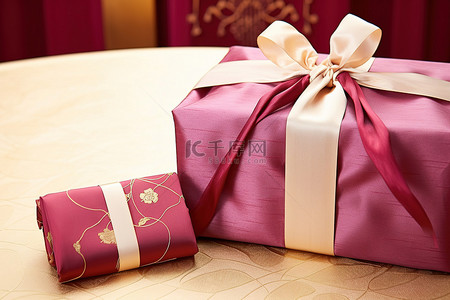 礼物丝带礼物背景图片_优雅的金丝带礼物卢展皇中国